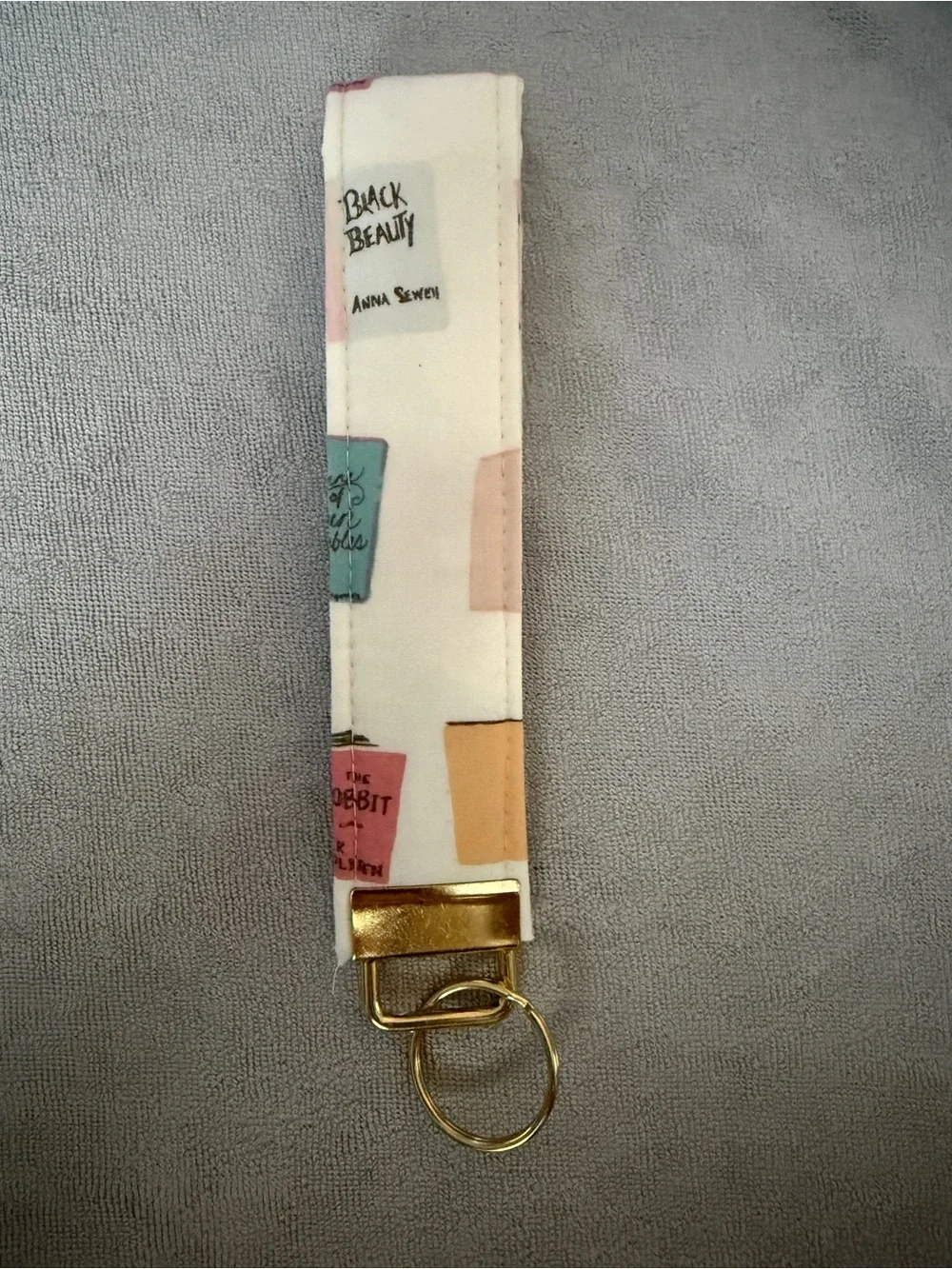 Book Print Wristlet Keychain - Cream with Pastel Blocks